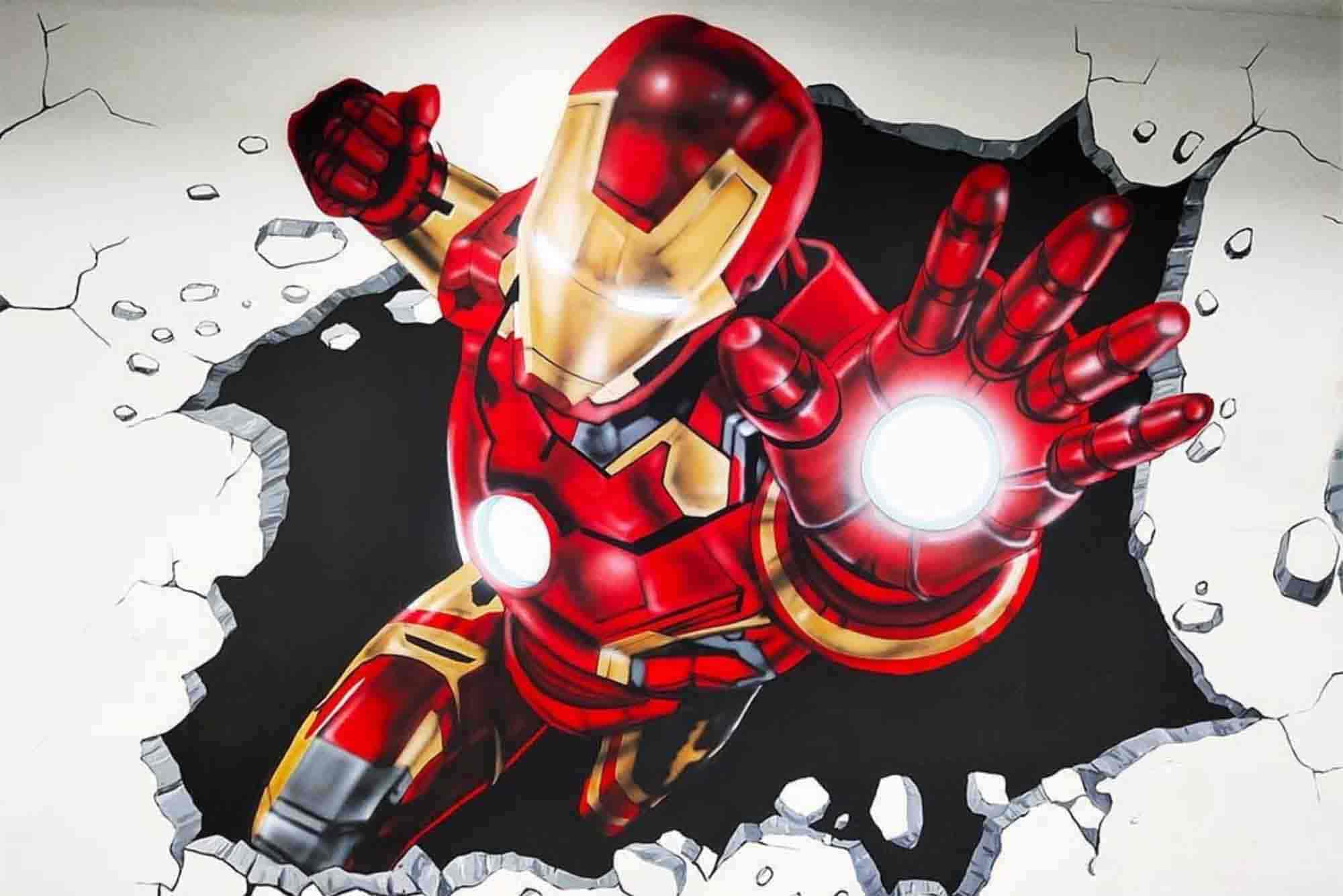3D Iron Man wall mural showing the superhero breaking through a cracked wall with glowing repulsor beams